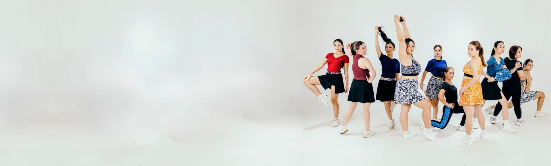 Friends wearing bright, art-inspired activewear outdoors